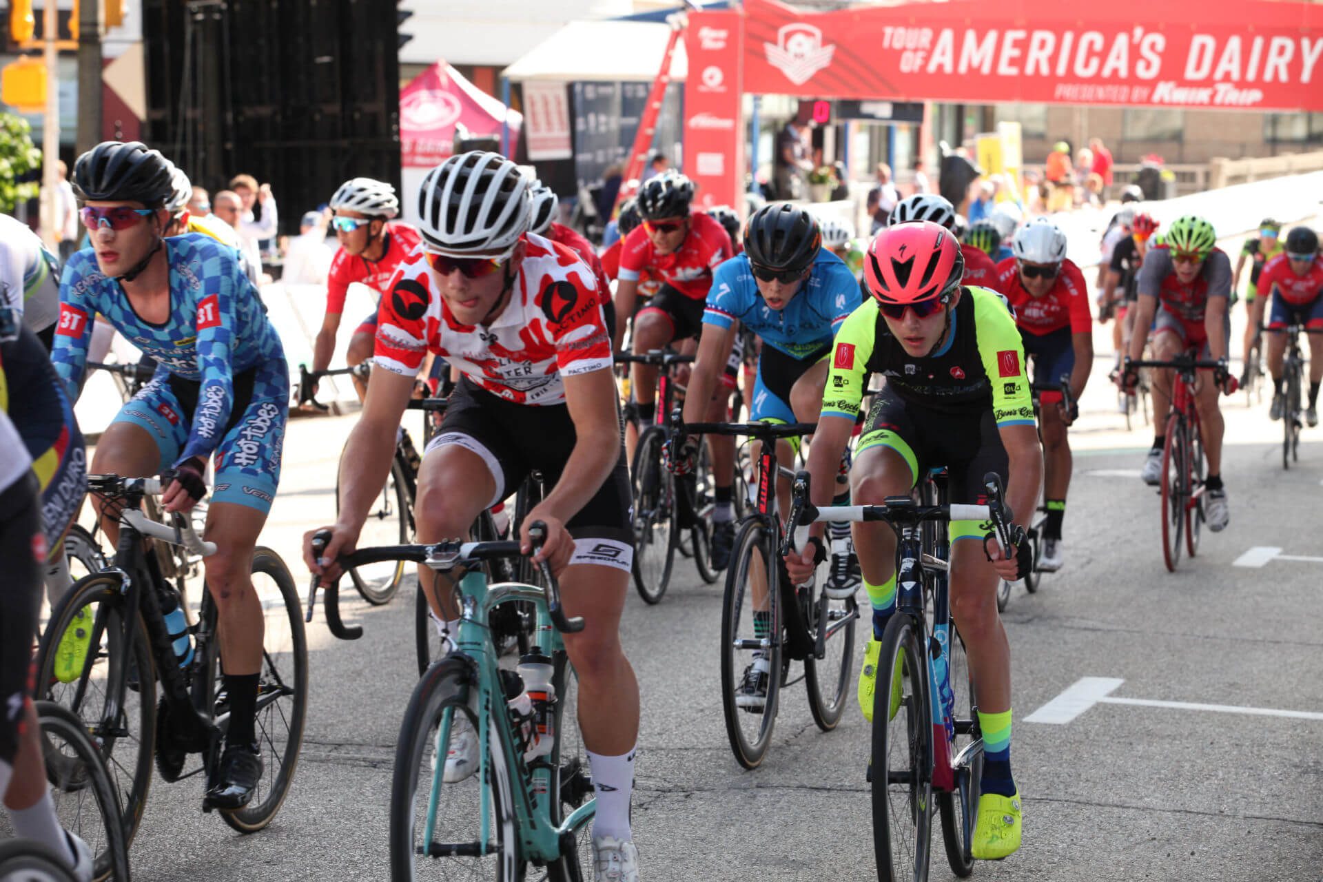 A group of bicyclists race during the Tour of America's Dairyland Series in downtown Janesville.